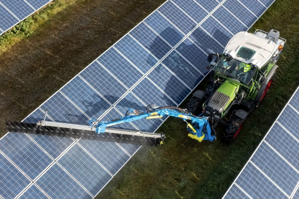 Tractor.SolarPanelCleaning Solar Panel Getting Cleaned