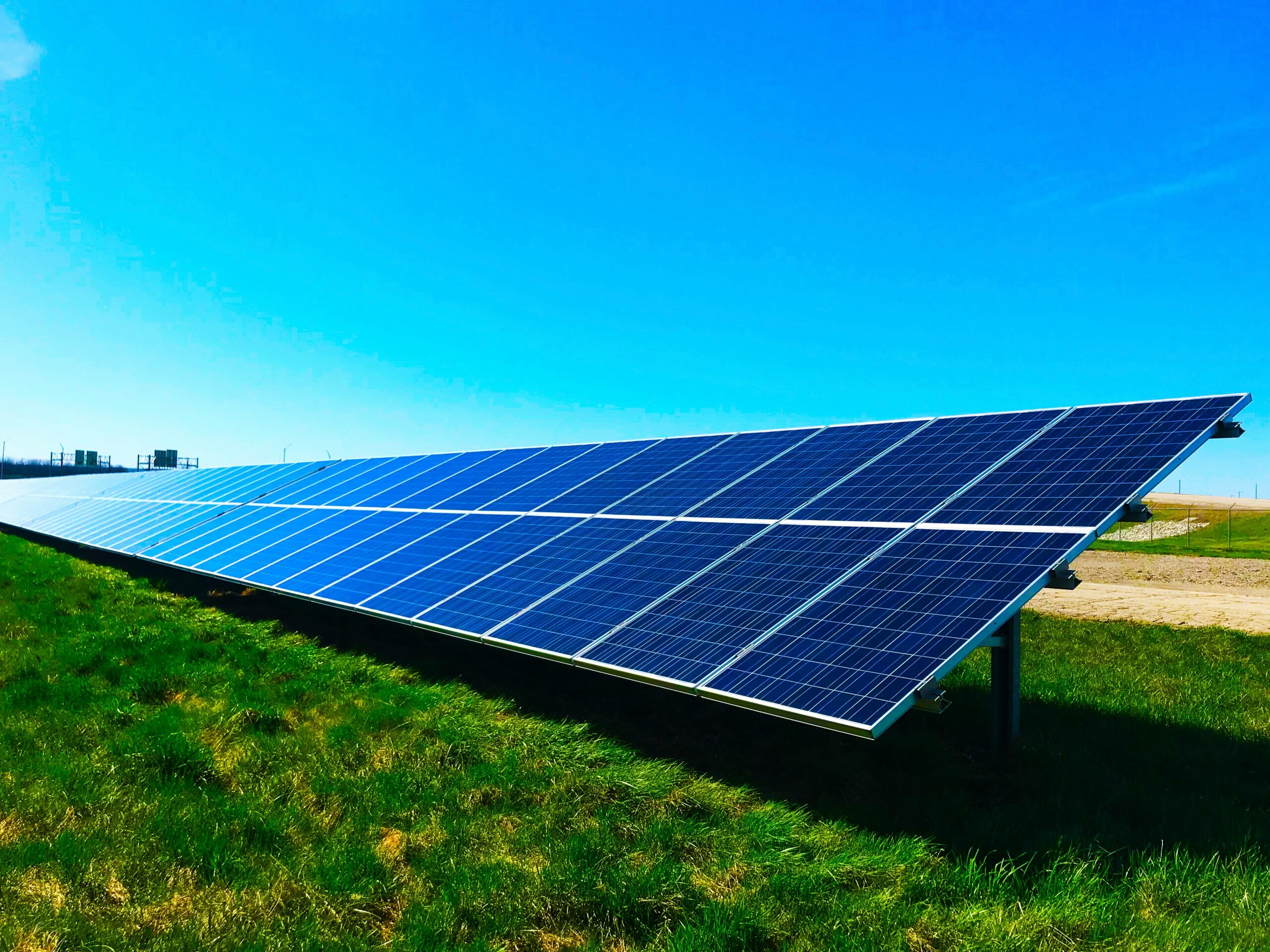 Solar Panel Field with bright blue sky